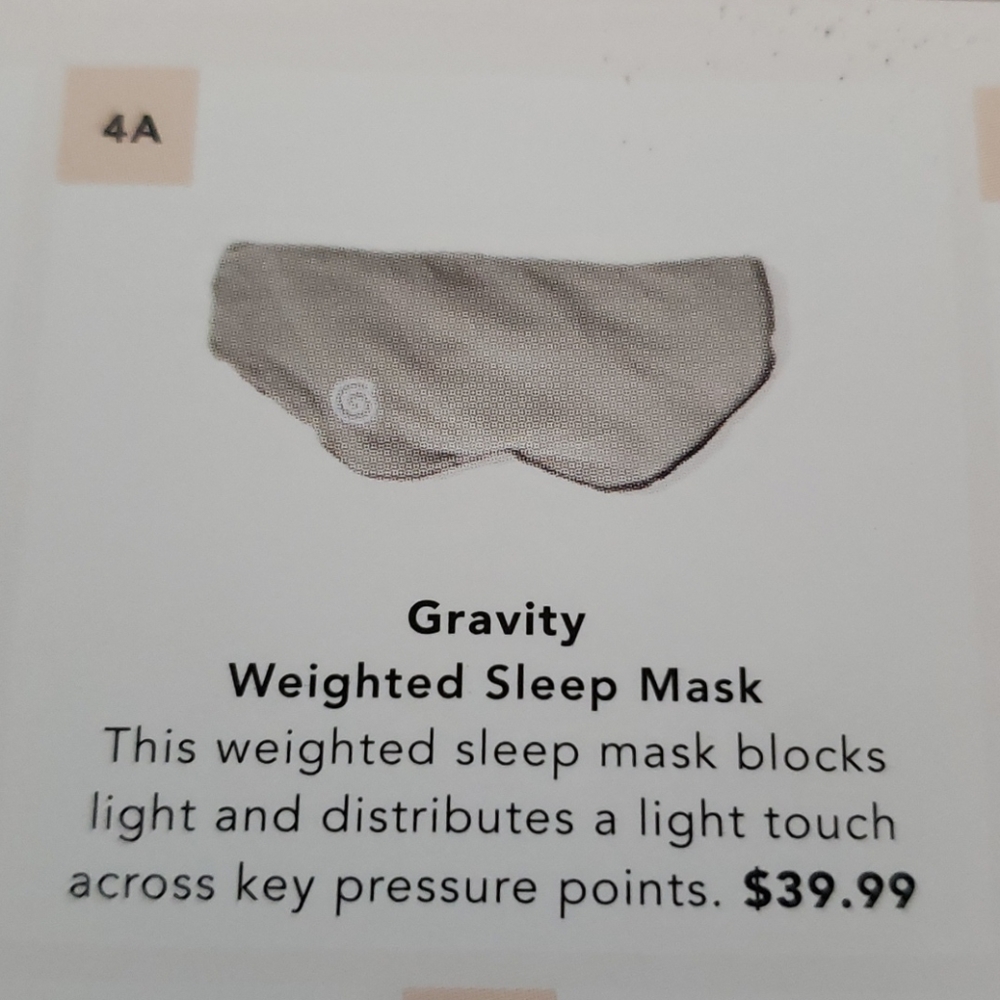Gravity weighted sleep mask